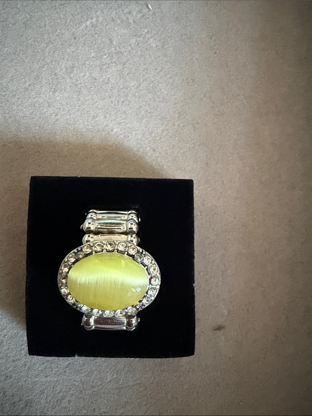 paparazzi Silver-Tone Stretch Ring with Yellow Cat's Eye and Crystal Halo